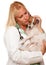 Attractive Female Doctor Veterinarian with Puppy