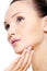Attractive female face in skincare treatment