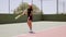 Attractive female tennis player wearing black