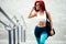 Attractive fit girl training and running. Portrait of fitness girl