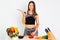 Attractive fitness woman, trained female Fit power athletic confident young woman bodybuilder doing exercises , Organic Food.