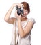 Attractive funny girl with a camera over white