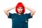 Attractive funny smilling caucasian brunette female doctor in red wig standing in office fooling