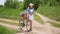 Attractive girl in a hat on a bicycle traveling in nature