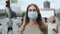 Attractive girl masks walking street corona virus. Crowd healthy people covid-19