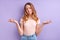 attractive girl misunderstanding, beautiful caucasian girl in casual wear shrugging, isolated on purple background