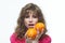 Attractive girl seductively holds oranges in her hands photo shoot in the studio on a white background