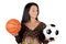 Attractive girl with soccer and basket ball