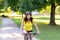 Attractive healthy woman riding a bicycle