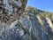 An attractive hiking trail through the rocks of the Schaftobelbach alpine canyon and to the Schaftobelfall waterfall