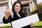 Attractive Hispanic Woman Holding Blank Sign