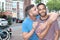 Attractive homosexual lovers kissing outdoors