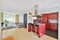 Attractive kitchen with a red kitchen set