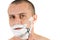 Attractive man shaving