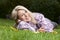 Attractive matured woman lying in the autumn grass