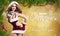 Attractive miss santa with `merry christmas` message