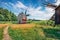 Attractive morning view of traditional romanian windmill. Captivating rural scene of Transylvania,