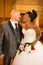 Attractive multi racial couple african bride and american caucasian groom during wedding celebration