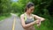 Attractive running female checking her smart watch with static step data.