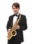 Attractive saxophonist with a saxophone in a suit.