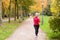 Attractive shapely young woman out jogging