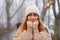Attractive smiling young girl wearing winter clothes