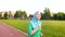 Attractive sporty muslim girl in hijab on a run