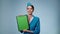 Attractive stewardess holding tablet with blank green sheet