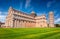 Attractive summer view of famous Leaning Tower in Pisa. Sunny morning scene with hundreds of tourists in Piazza dei Miracoli