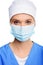 attractive surgeon in medical cap and mask,
