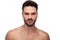 Attractive topless guy with beard looking angry