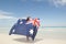 Attractive woman Australian flag at ocean beach