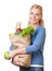 Attractive woman with a bag full of healthy eating