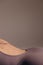 Attractive woman bending body close up. Athletic woman stretches her body on a mat in the studio