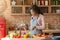 Attractive woman cooking healthy salad at kitchen