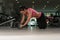 Attractive Woman Exercise With Wheel Roller For Abs