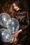 Attractive woman holding baloons and smiling, party and holiday season concept