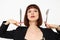 attractive woman knife and fork in hands emotions posing  background