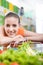 Attractive woman leaning on trolley