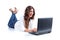 Attractive woman lying happy browsing in her laptop