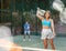 Attractive woman padel tennis player training on court