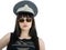 Attractive woman in policeman cap and glasses