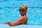 Attractive woman posing during relaxing in swimming pool during vacation