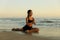 Attractive woman practicing Ardha Kapotasana, Half Pigeon Pose. Chest opener improving breathing. Healthy lifestyle. Yoga retreat