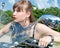 Attractive woman ride a black motorbike