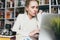 Attractive Woman Uses Laptop. Education, Online shopping, Remote Work And Other Meanings Concept