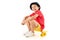 Attractive young boy sitting on a yellow skateboard on a white background