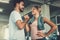 Attractive young couple handshaking after workout in fitness gym., Portrait of man and woman couple love are working out training