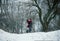 Attractive young couple in love in the snowy Park