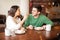 Attractive young couple sharing food